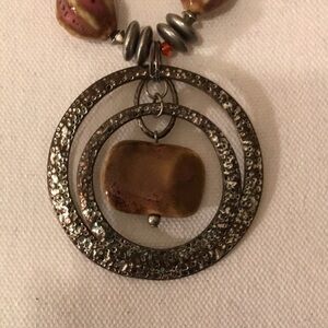 Bohemian beaded necklace with silver circle pendant